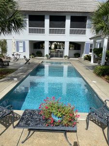 Large Ornate Swimming Pool, showcasing a pool cleaning service as done by Clear Pool Solutions in Vero, Beach, FL